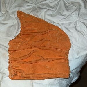 Orange off the shoulder top.